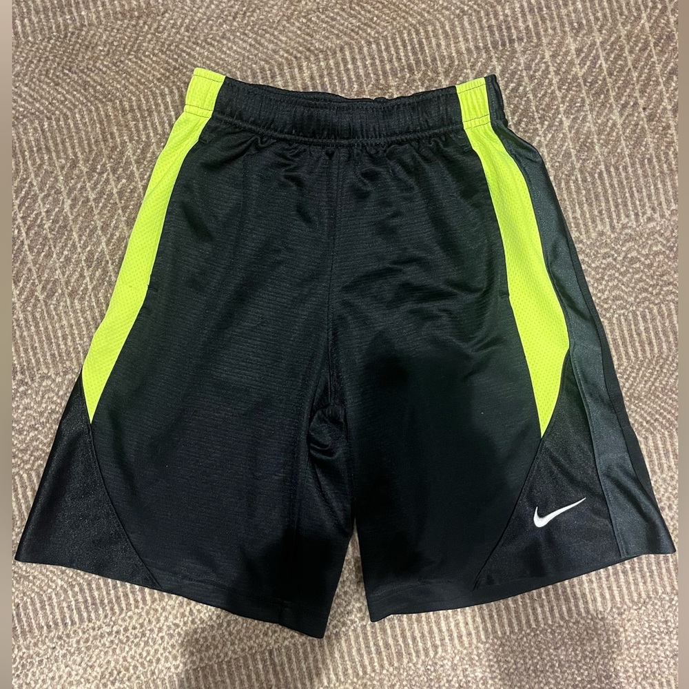 NIKE Black Athletic shorts with green stripe, size Youth S